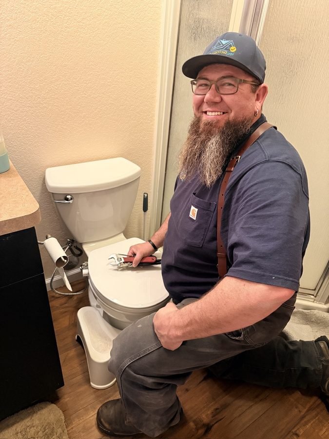 Austin replacing a toilet during a pre-listing punch list visit