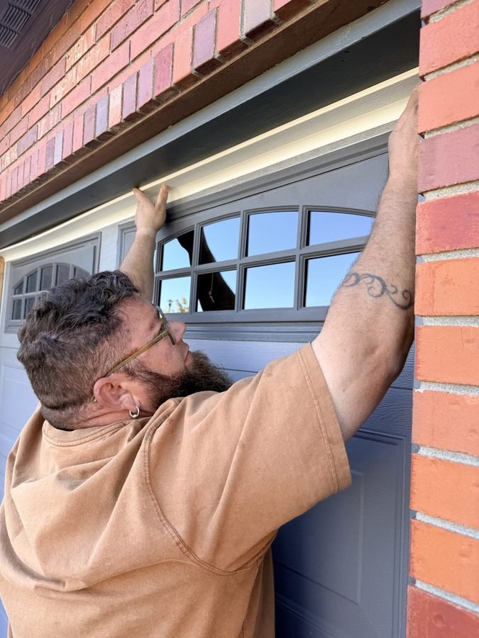 Austin replacing garage door weatherstripping before a Windsor, Colorado listing